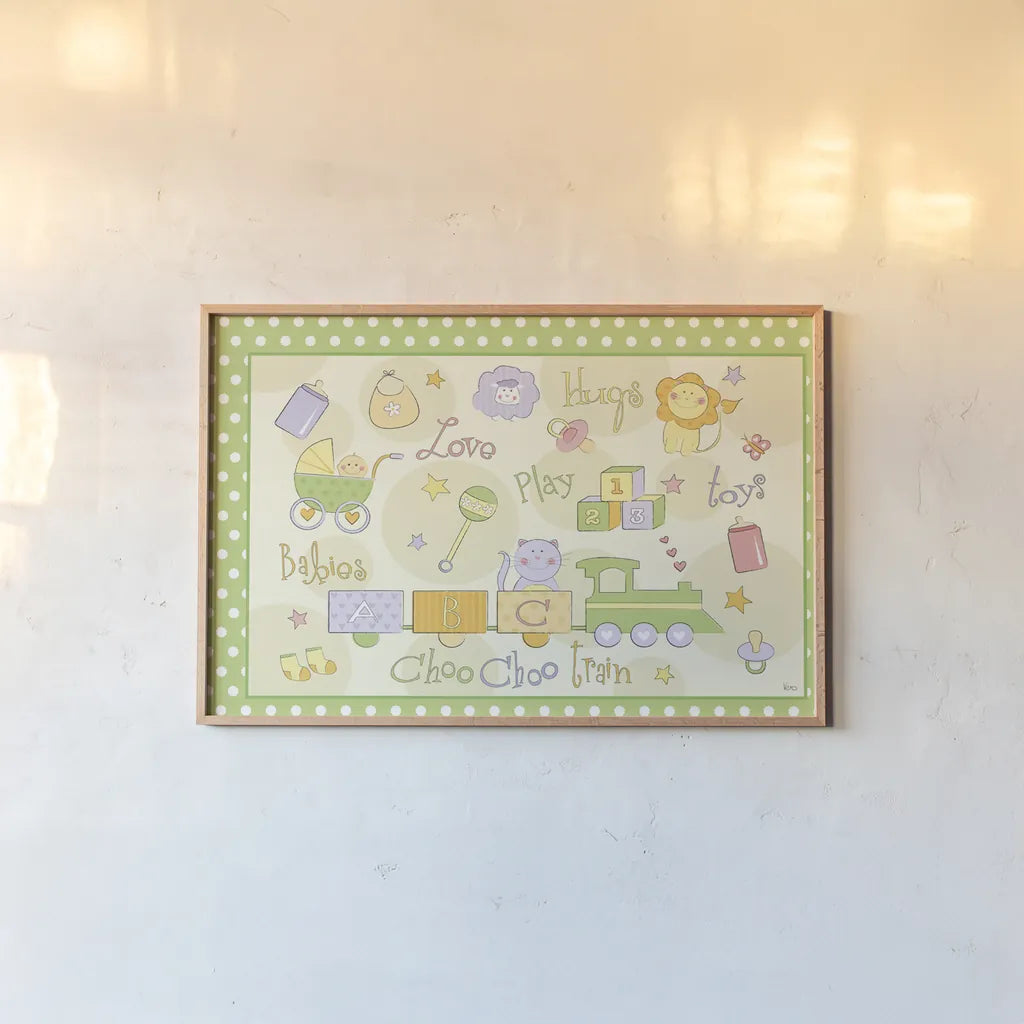 Toys and Hugs I Green by Veronique Charron. shown as a paper print in a natural frame. Available as a archival giclee rolled canvas, fine art paper, or poster print. SKU 101250i.