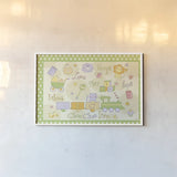Toys and Hugs I Green by Veronique Charron. shown as a paper print in a white frame. Available as a archival giclee rolled canvas, fine art paper, or poster print. SKU 101250i.
