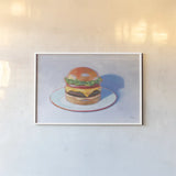Burger by Wellington Studio. shown as a paper print in a white frame. Available as a archival giclee rolled canvas, fine art paper, or poster print. SKU 90651i.