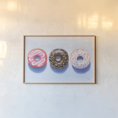 Doughnuts by Wellington Studio. shown as a paper print in a natural frame. Available as a archival giclee rolled canvas, fine art paper, or poster print. SKU 90650i.