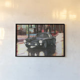 Ferrari by Wellington Studio. shown as a paper print in a black flame. Available as a archival giclee rolled canvas, fine art paper, or poster print. SKU 100517i.