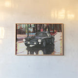 Ferrari by Wellington Studio. shown as a paper print in a natural frame. Available as a archival giclee rolled canvas, fine art paper, or poster print. SKU 100517i.