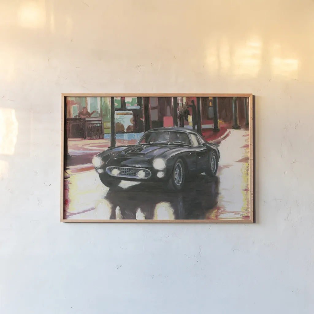 Ferrari by Wellington Studio. shown as a paper print in a natural frame. Available as a archival giclee rolled canvas, fine art paper, or poster print. SKU 100517i.