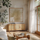 Gold Leaves II 18x18 by Wellington Studio. Shown in a natural wood frame in a cozy modern living room. Available as an archival giclee rolled canvas, fine art paper, or poster print. SKU 17377a.