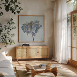Golden Hydrangea by Wellington Studio. Shown in a natural wood frame in a cozy modern living room. Available as an archival giclee rolled canvas, fine art paper, or poster print. SKU 89381a.