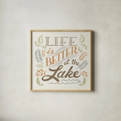 Lake Life I Green by Wellington Studio. Shown in a natural wood glass frame for a timeless modern aesthetic. Available as an archival giclee rolled canvas, fine art paper, or poster print. SKU 76131a.