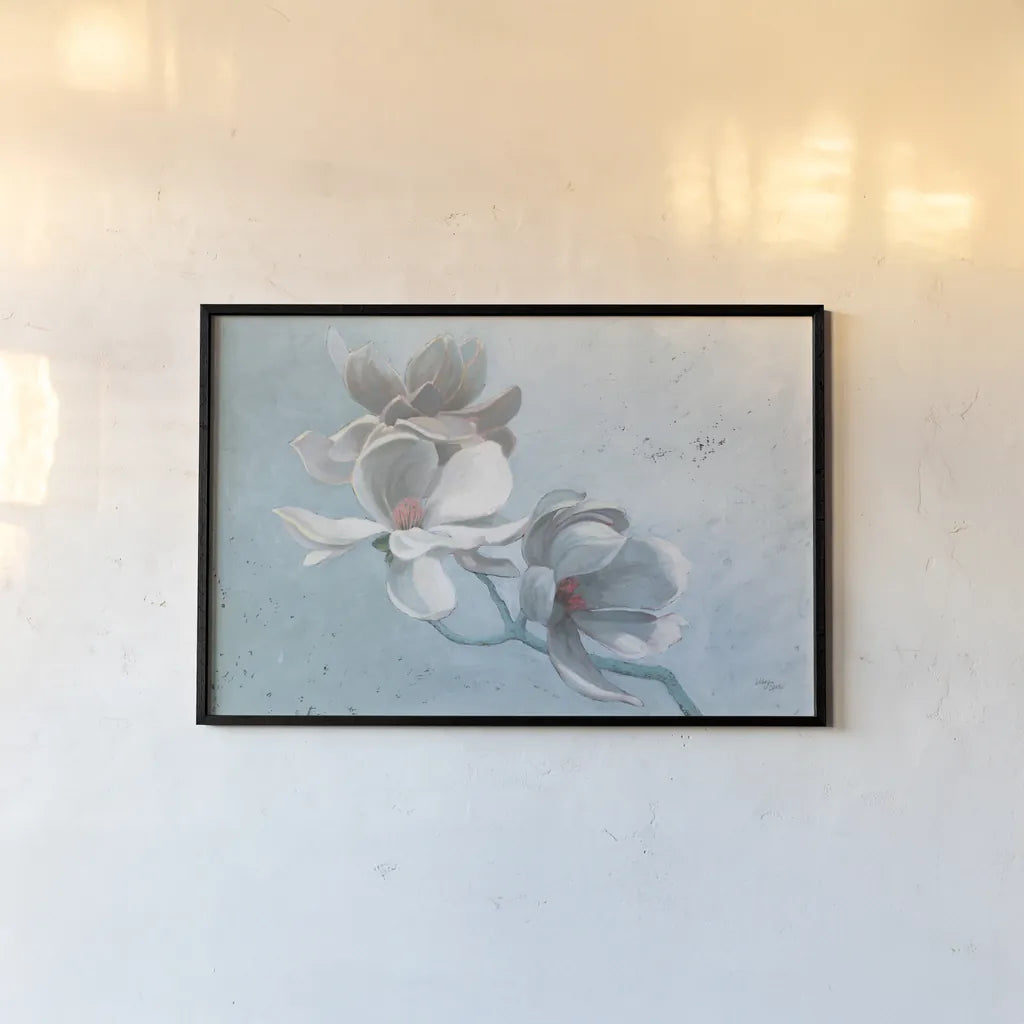 Magnolia Branch by Wellington Studio. shown as a paper print in a black flame. Available as a archival giclee rolled canvas, fine art paper, or poster print. SKU 89443i.
