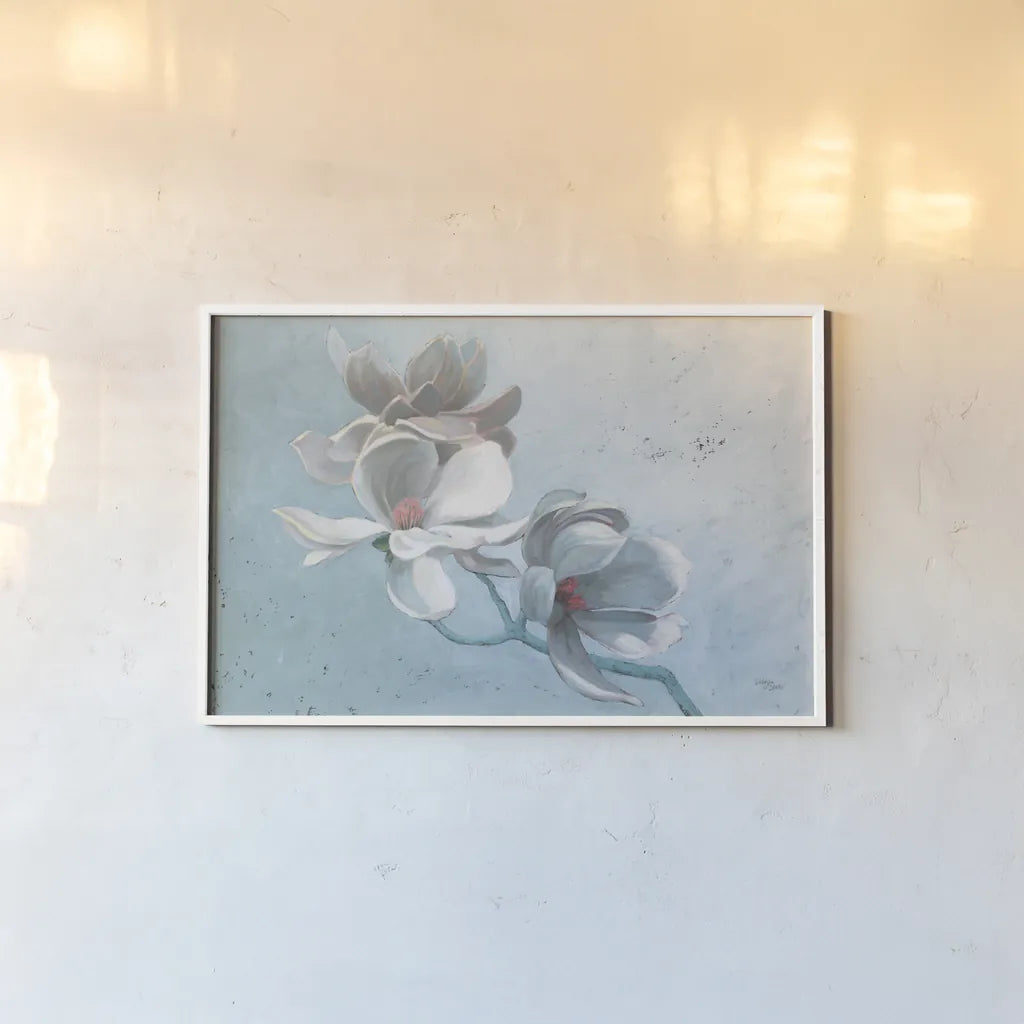 Magnolia Branch by Wellington Studio. shown as a paper print in a white frame. Available as a archival giclee rolled canvas, fine art paper, or poster print. SKU 89443i.
