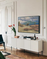 Northern Moose by Wellington Studio. shown as a framed stretched canvas in a living room above a console. Available as a archival giclee rolled canvas, fine art paper, or poster print. SKU 84086i.