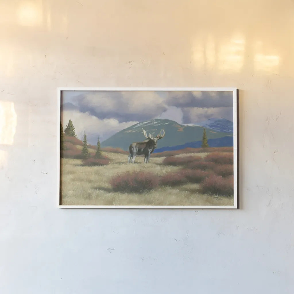 Northern Moose by Wellington Studio. shown as a paper print in a white frame. Available as a archival giclee rolled canvas, fine art paper, or poster print. SKU 84086i.