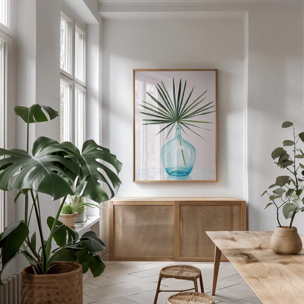 Statement Palms I by Wellington Studio. shown as a print in a natural wood frame in a dining room. Available as a archival giclee rolled canvas, fine art paper, or poster print. SKU 33610h.