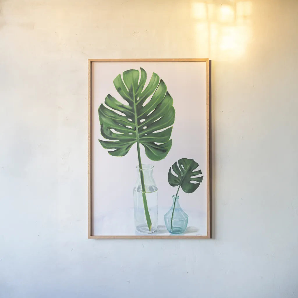 Statement Palms II by Wellington Studio. shown as a paper print in a natural frame. Available as a archival giclee rolled canvas, fine art paper, or poster print. SKU 33611h.