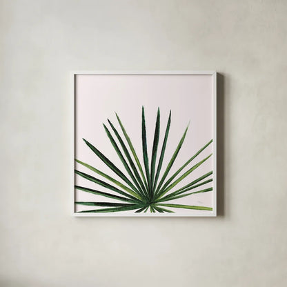 Statement Palms III by Wellington Studio. Shown in a crisp white glass frame for a clean and minimalist style. Available as an archival giclee rolled canvas, fine art paper, or poster print. SKU 33612a.