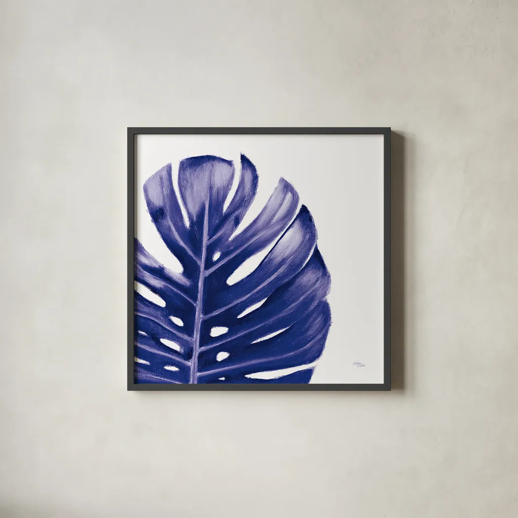Statement Palms IV Indigo by Wellington Studio. Shown in a sleek black glass frame for a contemporary gallery look. Available as an archival giclee rolled canvas, fine art paper, or poster print. SKU 34076a.