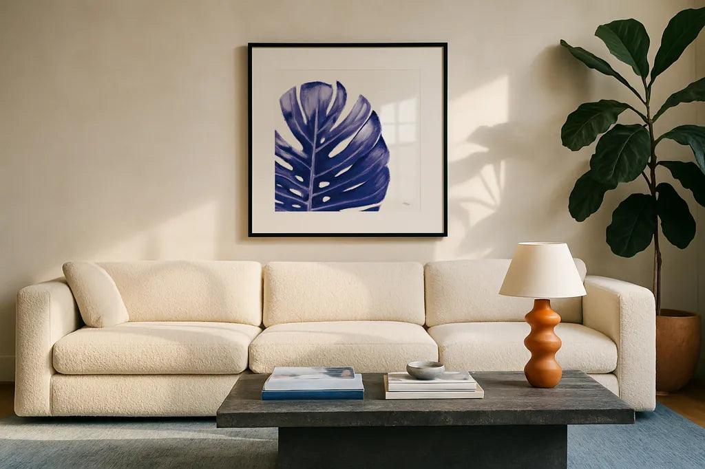 Statement Palms IV Indigo by Wellington Studio. Displayed in a glass frame with matte in a clean modern living room. Available as an archival giclee rolled canvas, fine art paper, or poster print. SKU 34076a.