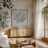 Sublime Peony II by Wellington Studio. Shown in a natural wood frame in a cozy modern living room. Available as an archival giclee rolled canvas, fine art paper, or poster print. SKU 88747a.