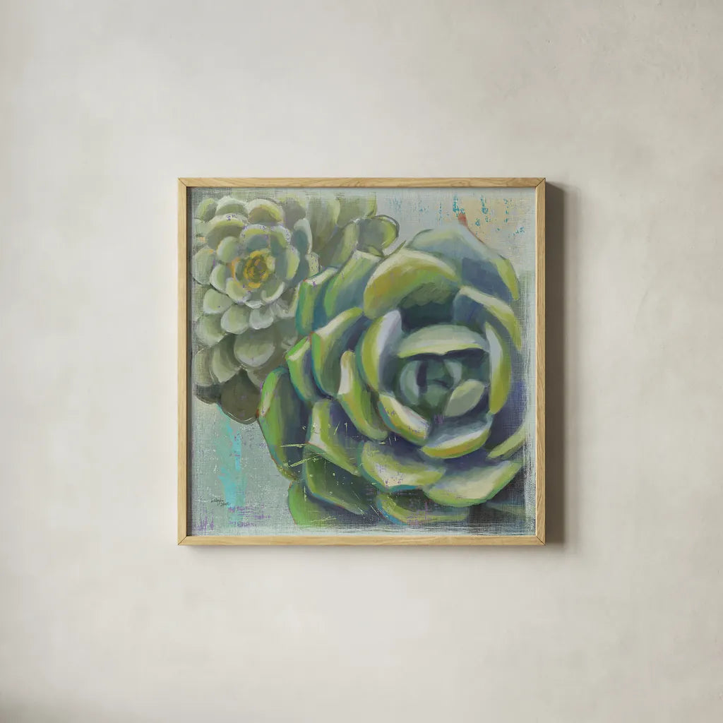 Succulents II by Wellington Studio. Shown in a natural wood glass frame for a timeless modern aesthetic. Available as an archival giclee rolled canvas, fine art paper, or poster print. SKU 22672a.
