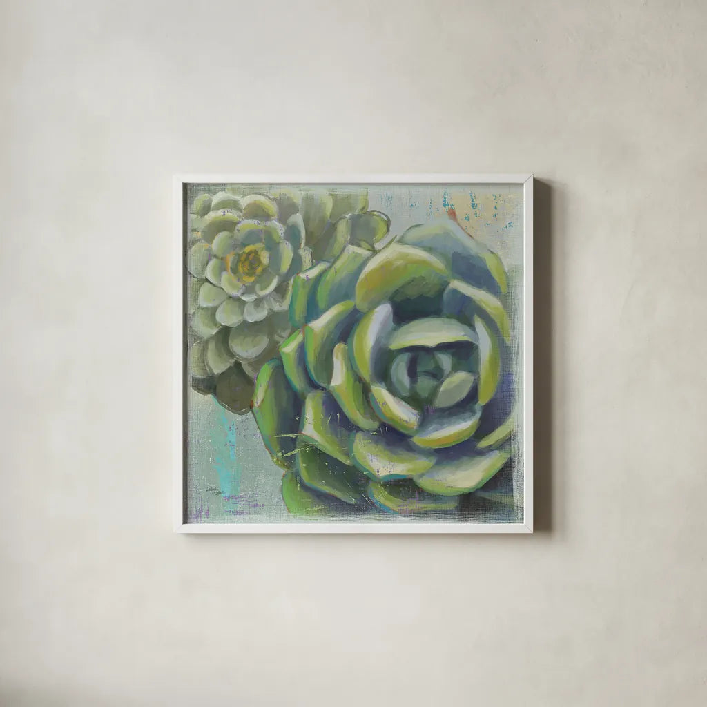 Succulents II by Wellington Studio. Shown in a crisp white glass frame for a clean and minimalist style. Available as an archival giclee rolled canvas, fine art paper, or poster print. SKU 22672a.