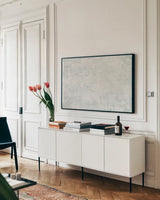 Textures VIII by Wellington Studio. shown as a framed stretched canvas in a living room above a console. Available as a archival giclee rolled canvas, fine art paper, or poster print. SKU 86887i.