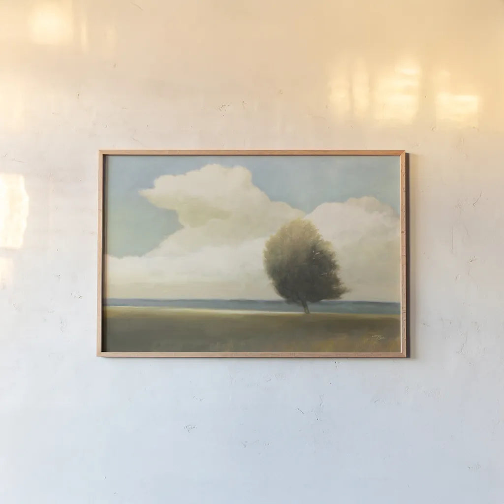 Windblown Tree by Wellington Studio. shown as a paper print in a natural frame. Available as a archival giclee rolled canvas, fine art paper, or poster print. SKU 89450i.