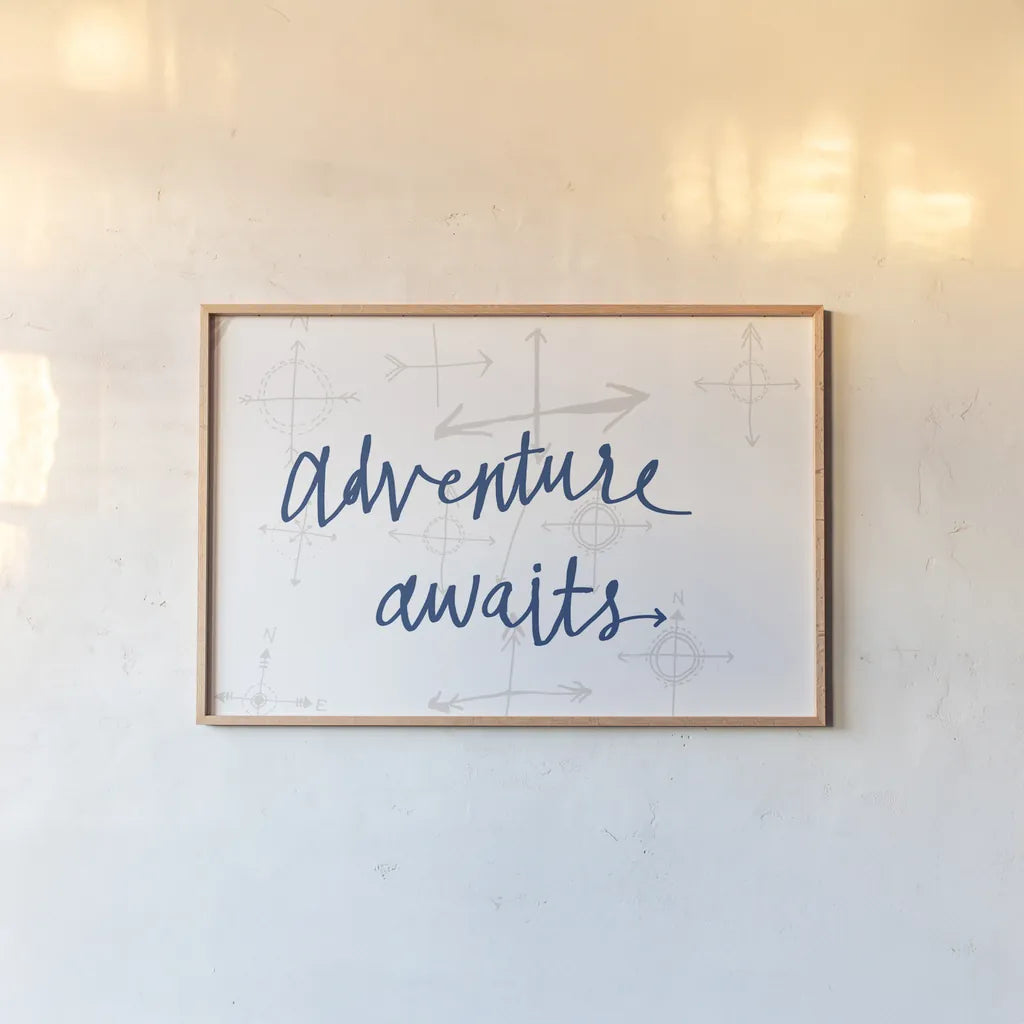 Adventure Awaits v2 by Wild Apple Portfolio. shown as a paper print in a natural frame. Available as a archival giclee rolled canvas, fine art paper, or poster print. SKU 37423i.