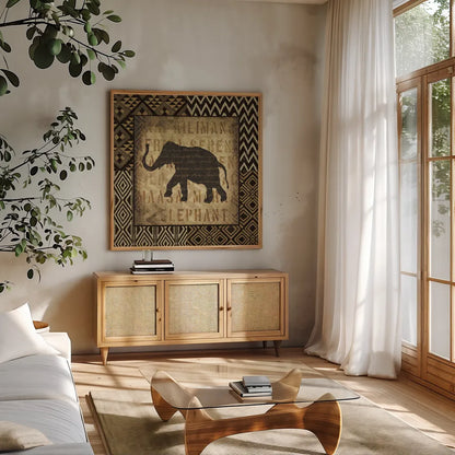 African Wild Elephant Border by Wild Apple Portfolio. Shown in a natural wood frame in a cozy modern living room. Available as an archival giclee rolled canvas, fine art paper, or poster print. SKU 16466a.