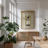 Antique Urn III Gold by Wild Apple Portfolio. shown as a print in a natural wood frame in a dining room. Available as a archival giclee rolled canvas, fine art paper, or poster print. SKU 104708h.