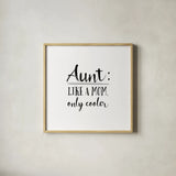 Aunt Inspiration I by Wild Apple Portfolio. Shown in a natural wood glass frame for a timeless modern aesthetic. Available as an archival giclee rolled canvas, fine art paper, or poster print. SKU 54318a.