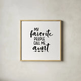 Aunt Inspiration IV by Wild Apple Portfolio. Shown in a natural wood glass frame for a timeless modern aesthetic. Available as an archival giclee rolled canvas, fine art paper, or poster print. SKU 54754a.