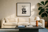 Bake II Farmhouse by Wild Apple Portfolio. Displayed in a glass frame with matte in a clean modern living room. Available as an archival giclee rolled canvas, fine art paper, or poster print. SKU 77193a.