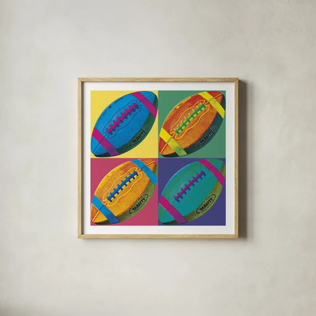 Ball Four Football by Wild Apple Portfolio. Shown in a natural wood glass frame for a timeless modern aesthetic. Available as an archival giclee rolled canvas, fine art paper, or poster print. SKU 9872a.