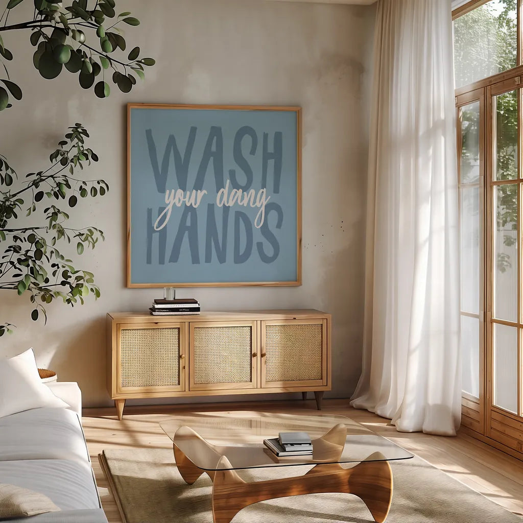 Bathroom Advice I by Wild Apple Portfolio. Shown in a natural wood frame in a cozy modern living room. Available as an archival giclee rolled canvas, fine art paper, or poster print. SKU 62974a.