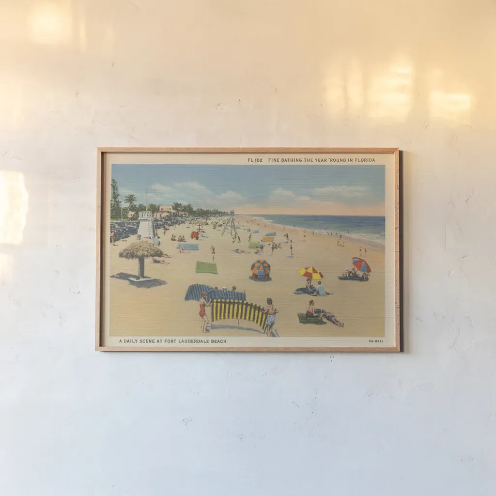 Beach Postcard I by Wild Apple Portfolio. shown as a paper print in a natural frame. Available as a archival giclee rolled canvas, fine art paper, or poster print. SKU 57443i.