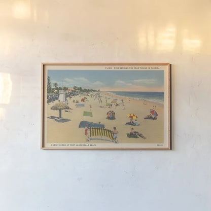 Beach Postcard I by Wild Apple Portfolio. shown as a paper print in a natural frame. Available as a archival giclee rolled canvas, fine art paper, or poster print. SKU 57443i.