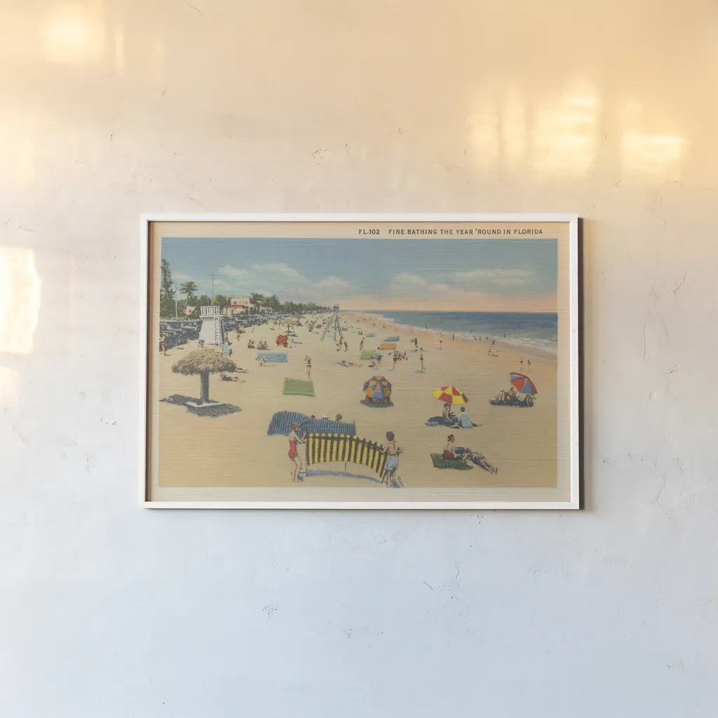 Beach Postcard I Plain Border by Wild Apple Portfolio. shown as a paper print in a white frame. Available as a archival giclee rolled canvas, fine art paper, or poster print. SKU 57822i.