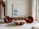 Beach Sayings I Dark Blue by Wild Apple Portfolio. Shown as extra-large giant wall art in a modern living room. Available as an archival giclee rolled canvas, fine art paper, or poster print. SKU 89040a.