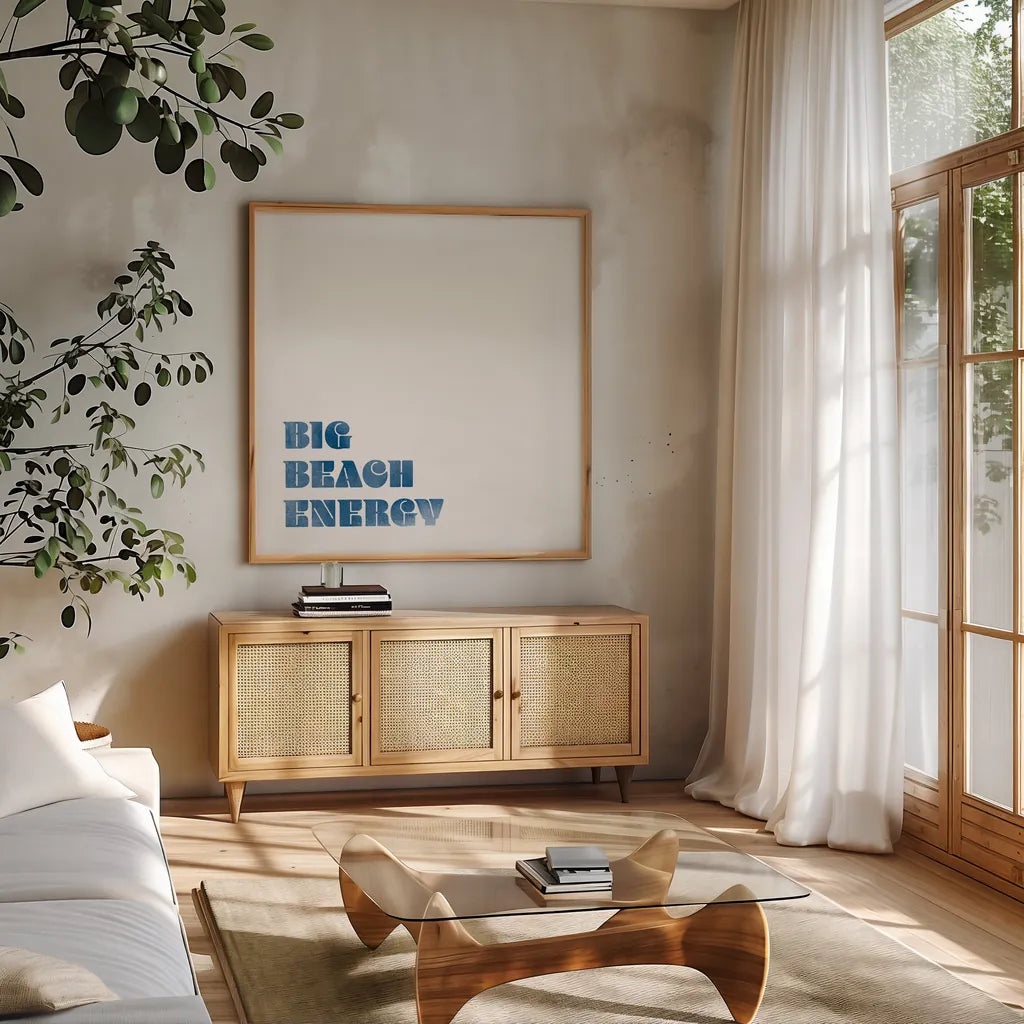 Beach Sayings IV Dark Blue by Wild Apple Portfolio. Shown in a natural wood frame in a cozy modern living room. Available as an archival giclee rolled canvas, fine art paper, or poster print. SKU 89041a.