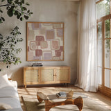 Blocks Blush by Wild Apple Portfolio. Shown in a natural wood frame in a cozy modern living room. Available as an archival giclee rolled canvas, fine art paper, or poster print. SKU 42734a.