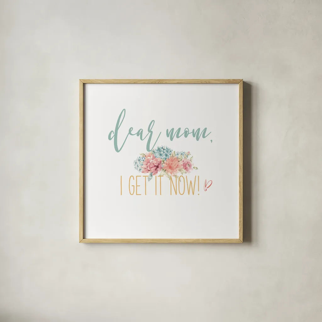 Bloom Mom Inspiration I by Wild Apple Portfolio. Shown in a natural wood glass frame for a timeless modern aesthetic. Available as an archival giclee rolled canvas, fine art paper, or poster print. SKU 57245a.