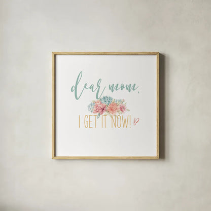 Bloom Mom Inspiration I by Wild Apple Portfolio. Shown in a natural wood glass frame for a timeless modern aesthetic. Available as an archival giclee rolled canvas, fine art paper, or poster print. SKU 57245a.