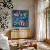 Boho Reef Fish I by Wild Apple Portfolio. Shown in a natural wood frame in a cozy modern living room. Available as an archival giclee rolled canvas, fine art paper, or poster print. SKU 27595a.