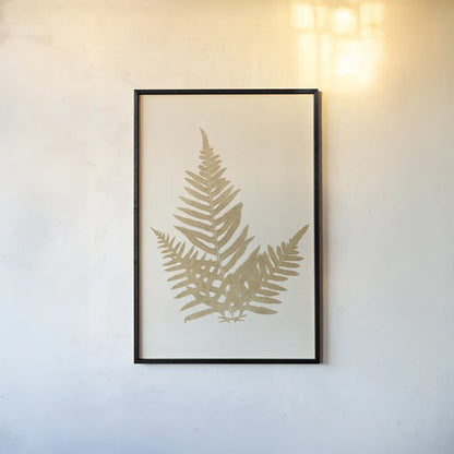 Botanical Fern XI Gold by Wild Apple Portfolio. shown as a paper print in a black flame. Available as a archival giclee rolled canvas, fine art paper, or poster print. SKU 57688h.