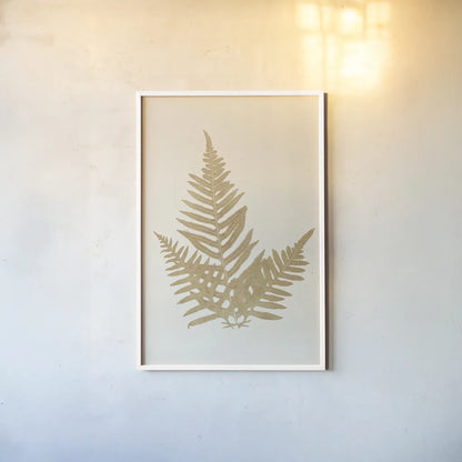 Botanical Fern XI Gold by Wild Apple Portfolio. shown as a paper print in a white frame. Available as a archival giclee rolled canvas, fine art paper, or poster print. SKU 57688h.