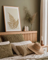 Botanical Fern XVIII Gold by Wild Apple Portfolio. shown as a paper print in a natural frame. Available as a archival giclee rolled canvas, fine art paper, or poster print. SKU 57689h.