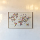 Botanical Floral Map Light Words by Wild Apple Portfolio. shown as a paper print in a white frame. Available as a archival giclee rolled canvas, fine art paper, or poster print. SKU 54700i.