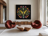 Butterfly Mandala III Black by Wild Apple Portfolio. Shown as extra-large giant wall art in a modern living room. Available as an archival giclee rolled canvas, fine art paper, or poster print. SKU 51121a.