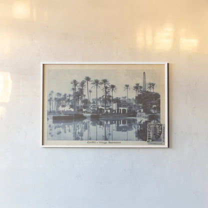 Cairo Village by Wild Apple Portfolio. shown as a paper print in a white frame. Available as a archival giclee rolled canvas, fine art paper, or poster print. SKU 71225i.