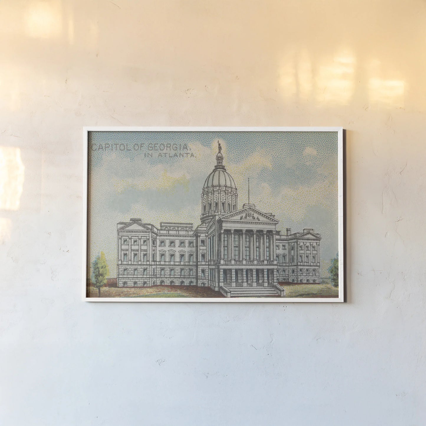 Capitol of Georgia in Atlanta by Wild Apple Portfolio. shown as a paper print in a white frame. Available as a archival giclee rolled canvas, fine art paper, or poster print. SKU 101643i.