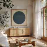 Celestial Sphere South Square by Wild Apple Portfolio. Shown in a natural wood frame in a cozy modern living room. Available as an archival giclee rolled canvas, fine art paper, or poster print. SKU 72642a.