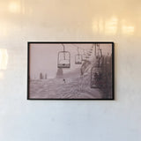 Chairlifts At Aspen by Wild Apple Portfolio. shown as a paper print in a black flame. Available as a archival giclee rolled canvas, fine art paper, or poster print. SKU 104288i.
